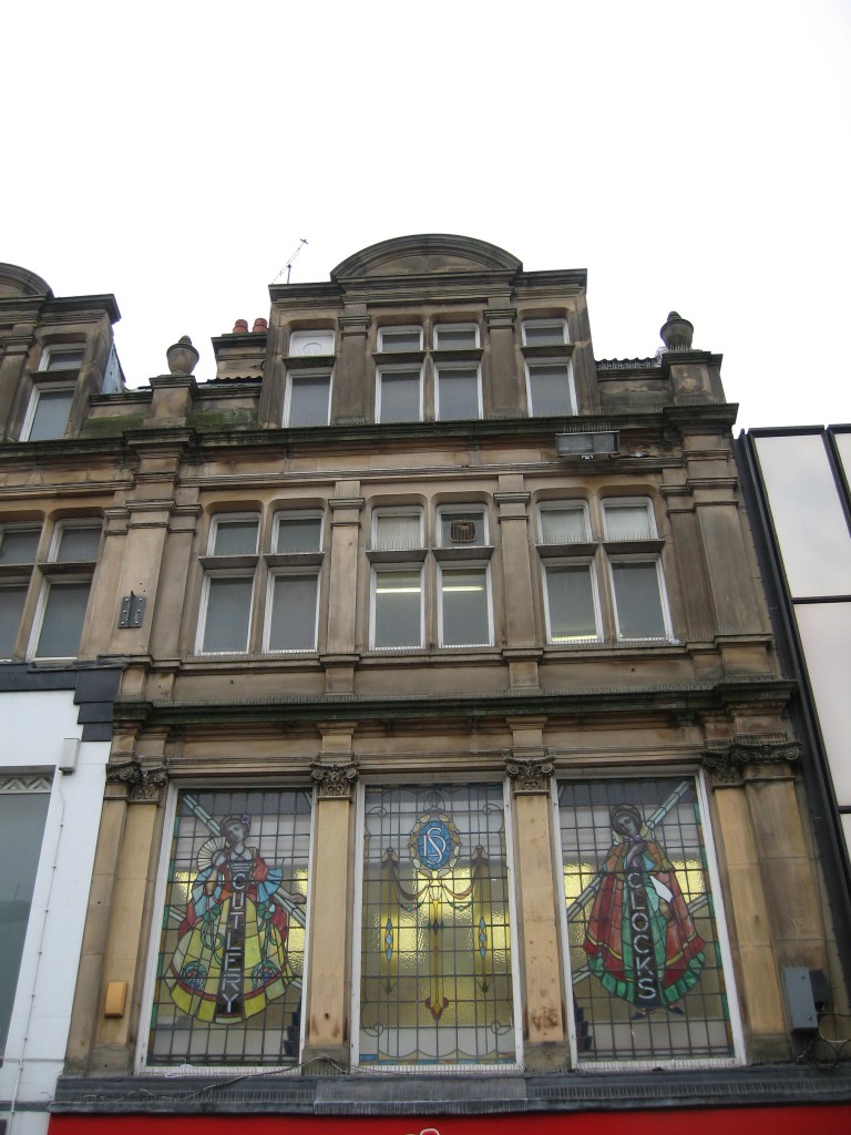 Victorian building with stained glass windows