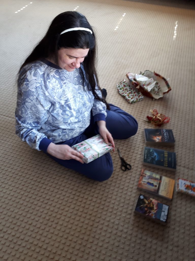 Unwrapping presents.