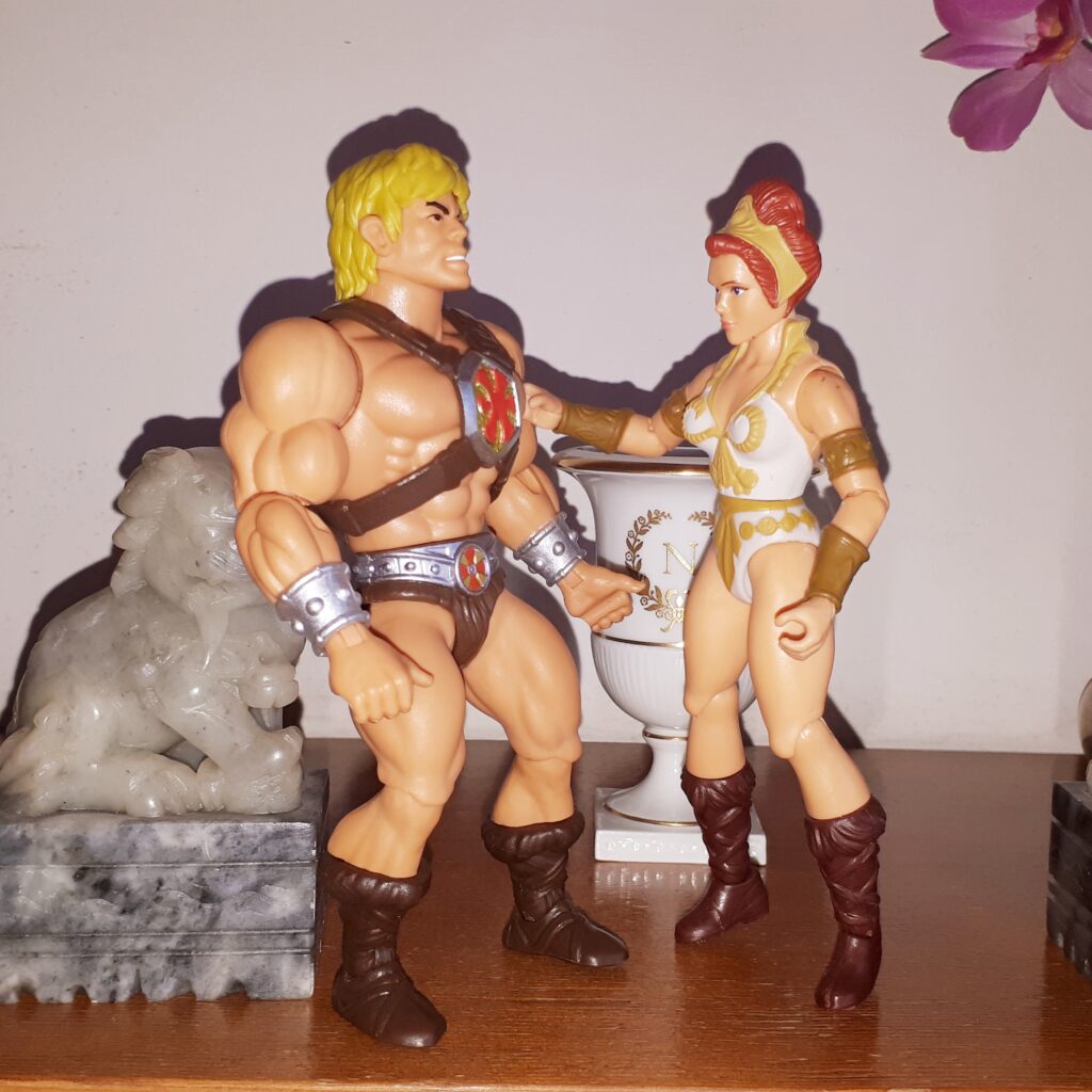 Teela admires He-Man's abs