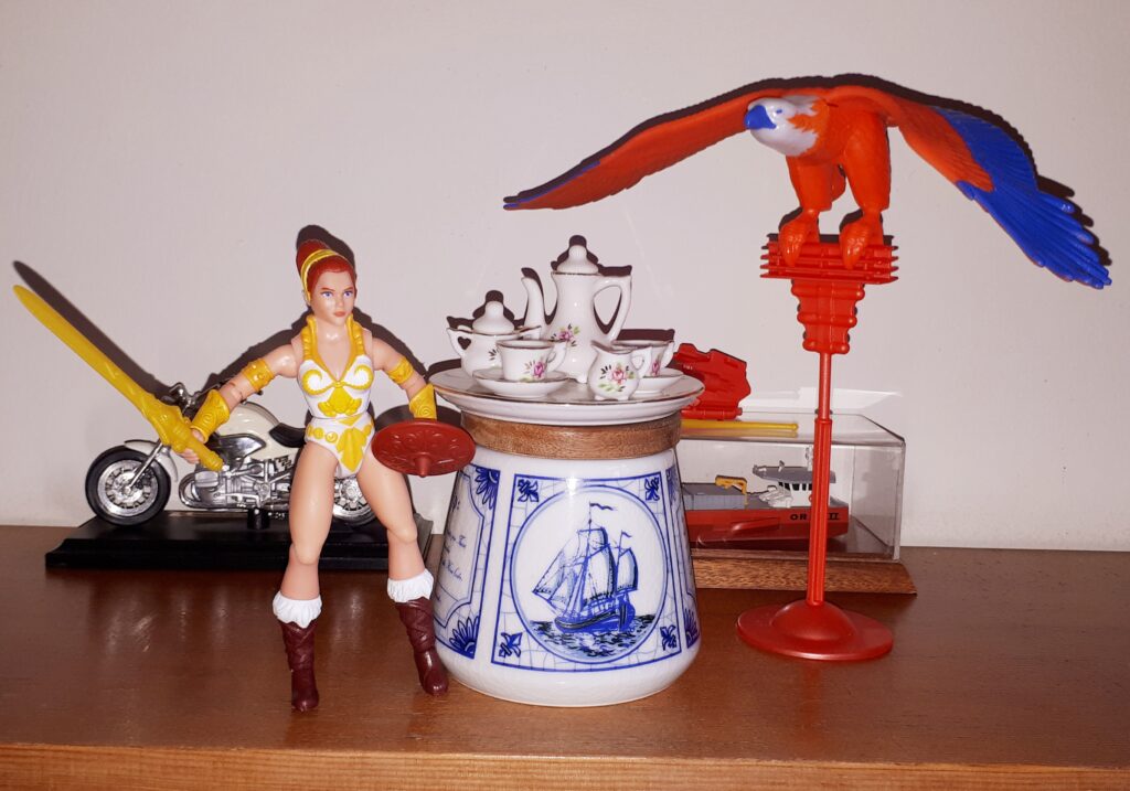 Teela and Zoar the Falcon have tea.