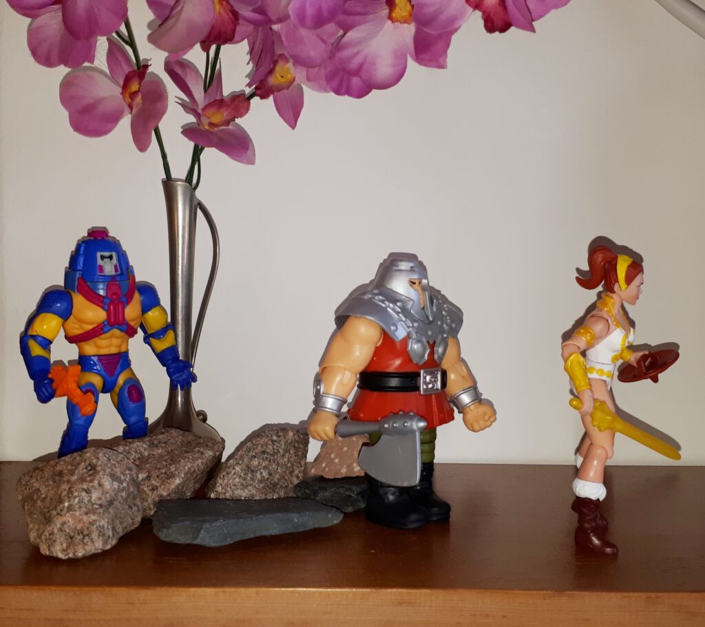 Teela stalks off angry, while Ram-Man and Man-e-Faces look after her.