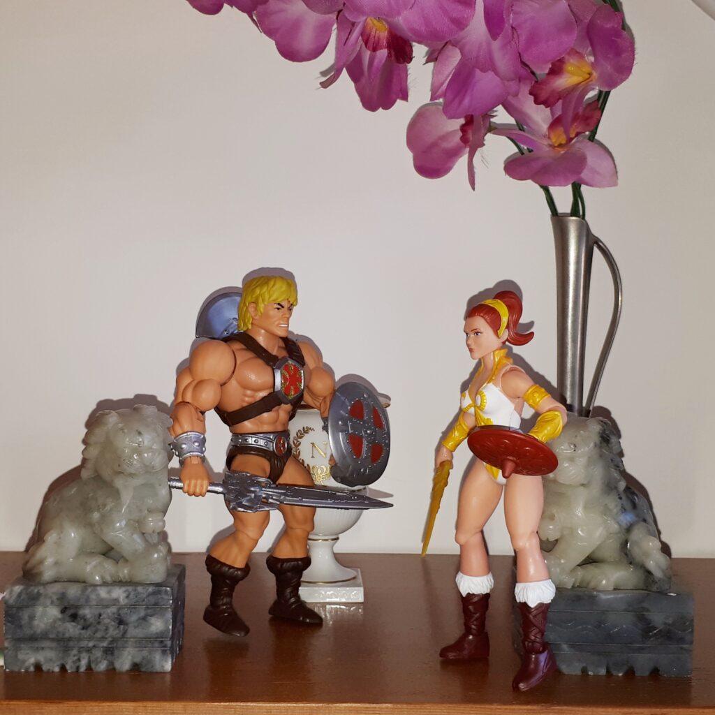 Teela meets He-Man in the palace garden.