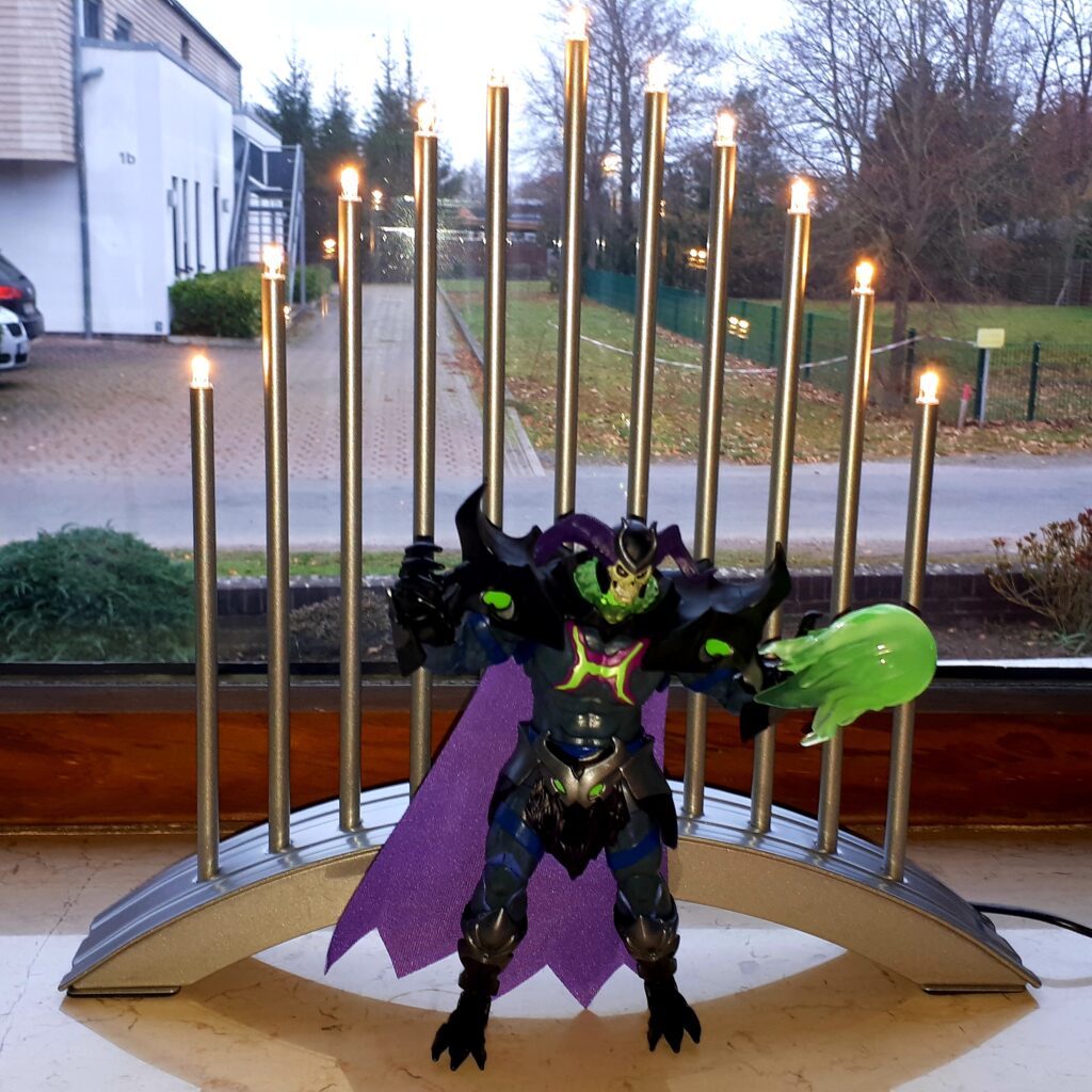 Skelegod figure with Christmas lights