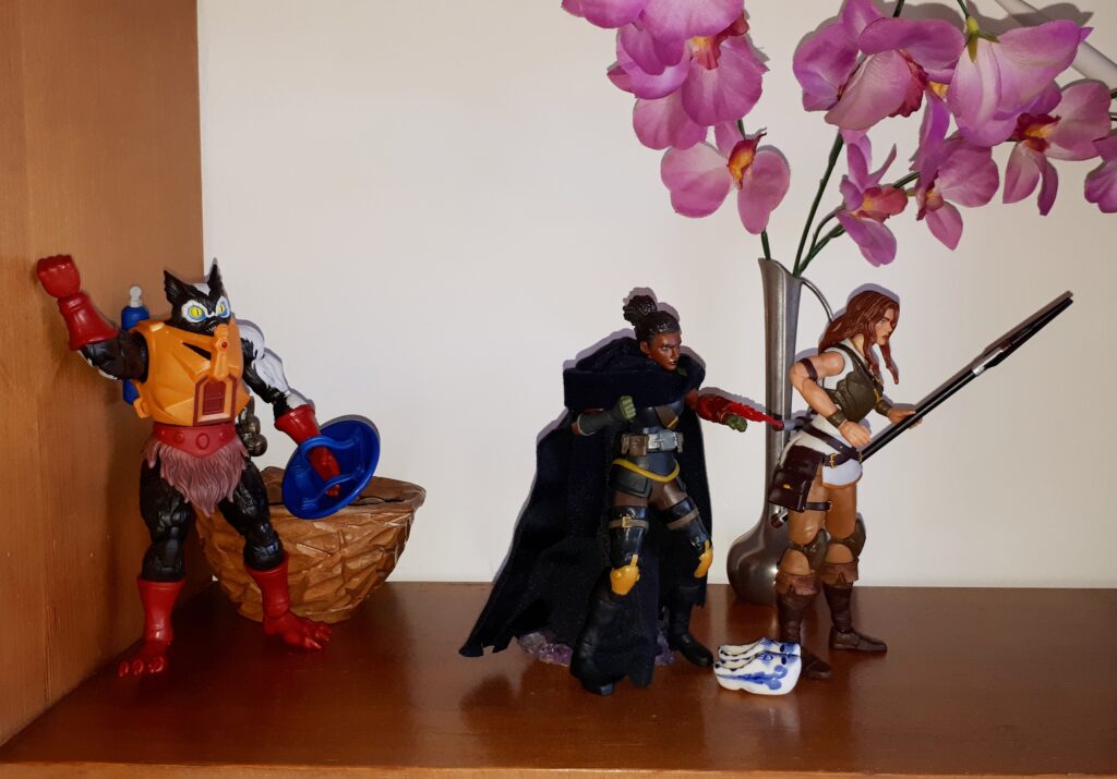 Stinkor rants as Andra and Teela escape with the sacred wooden shoes.
