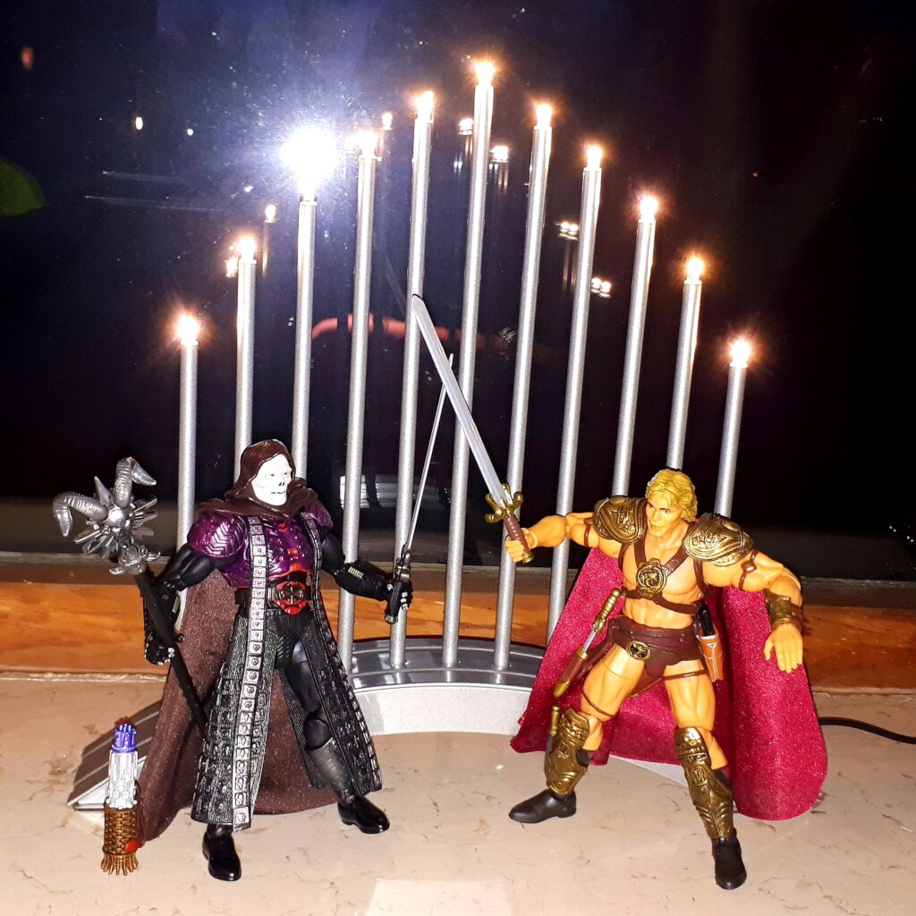 Movie Skeletor and He-Man fight.