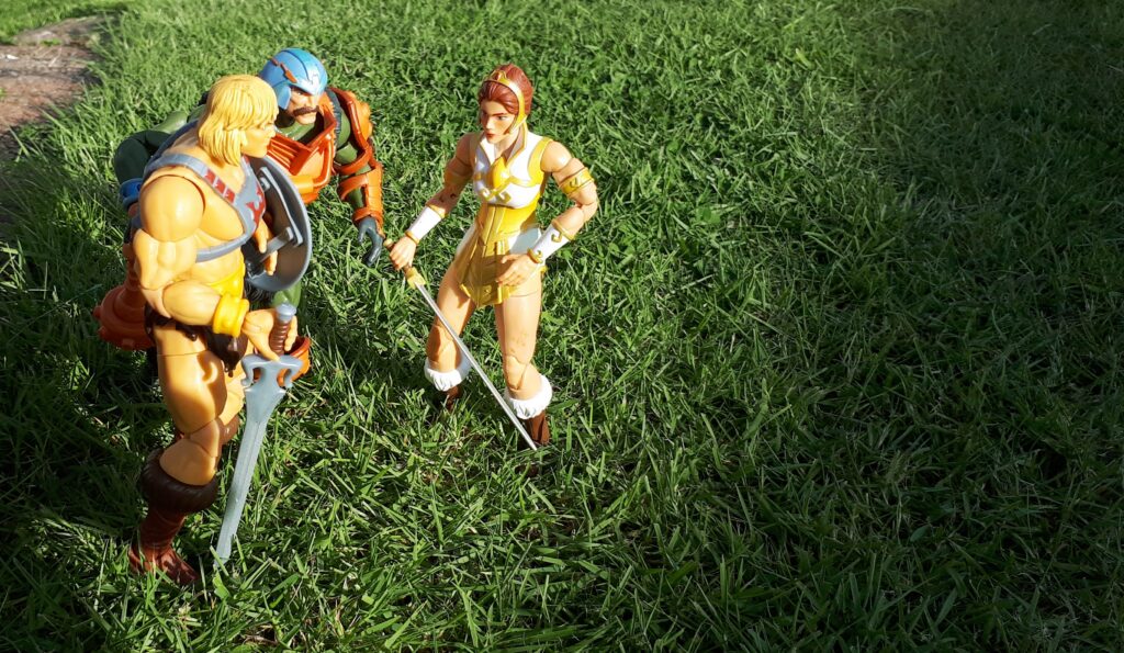 He-Man, Duncan and Teela look out across the plains of Eternia.