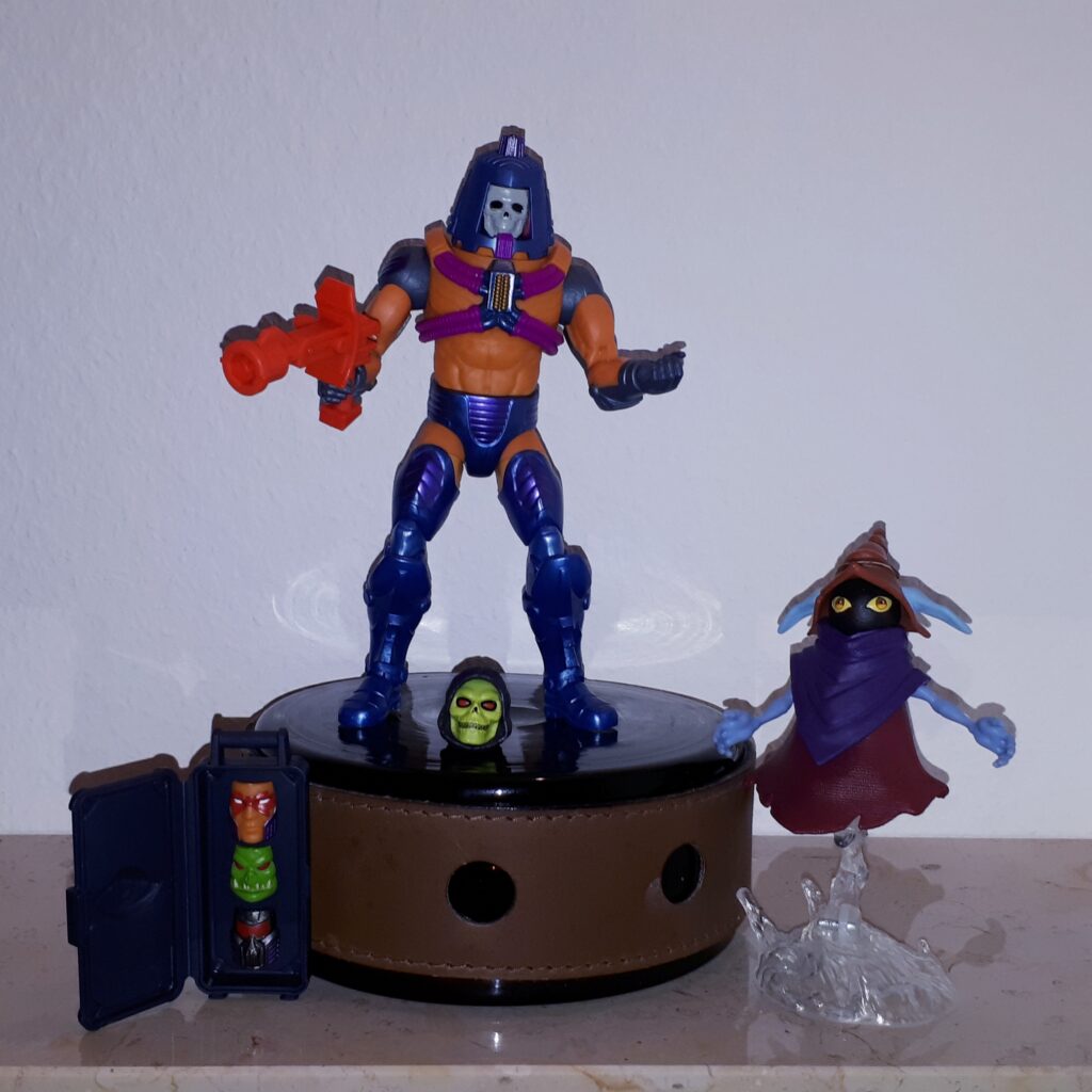 Man-e-Faces on stage with his Skeletor face, while Orko announces him.