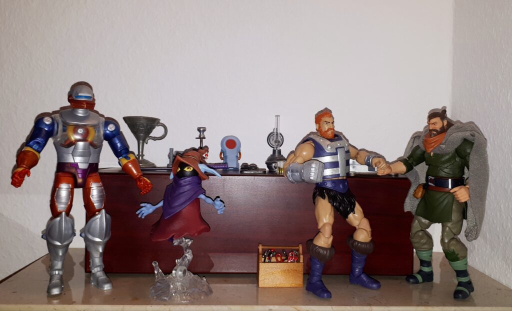 Malcolm talks to Duncan, while Orko talks to Roboto.
