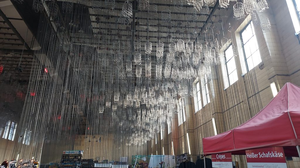 Cages and chains dangling from the ceiling the washing hall of the Fürst Leopold mine
