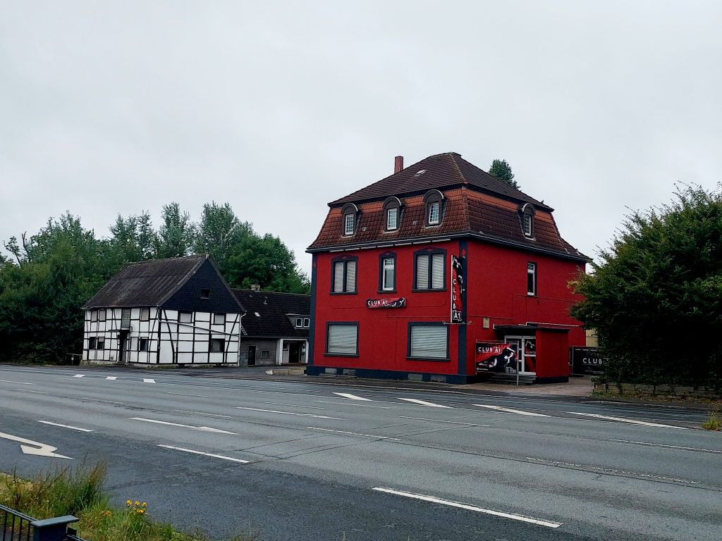 Timbered house and Club A1 brothel